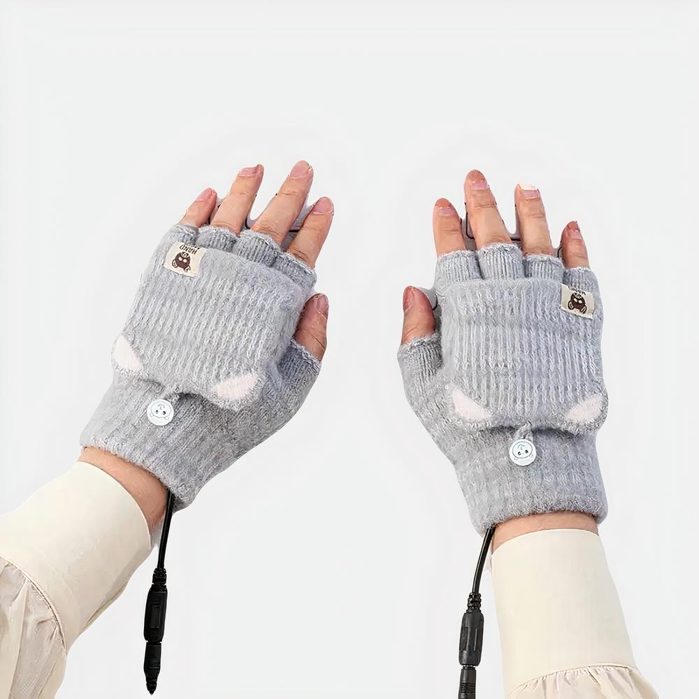 Gants chauffants en tricot pour femme Gants chauffants gris déclinables en mitaines sur un clavier d'ordinateur
