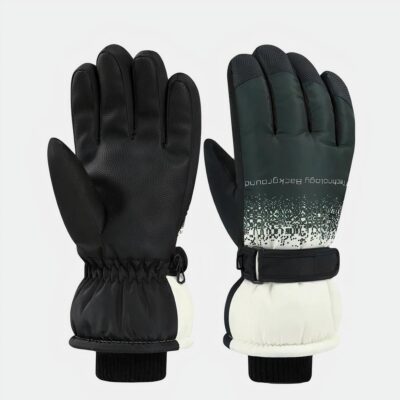 Gants de ski noirs sur fond gris.