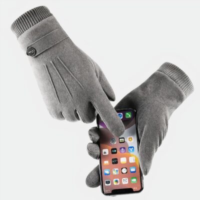 Gants gris sur fond blanc avec un téléphone.